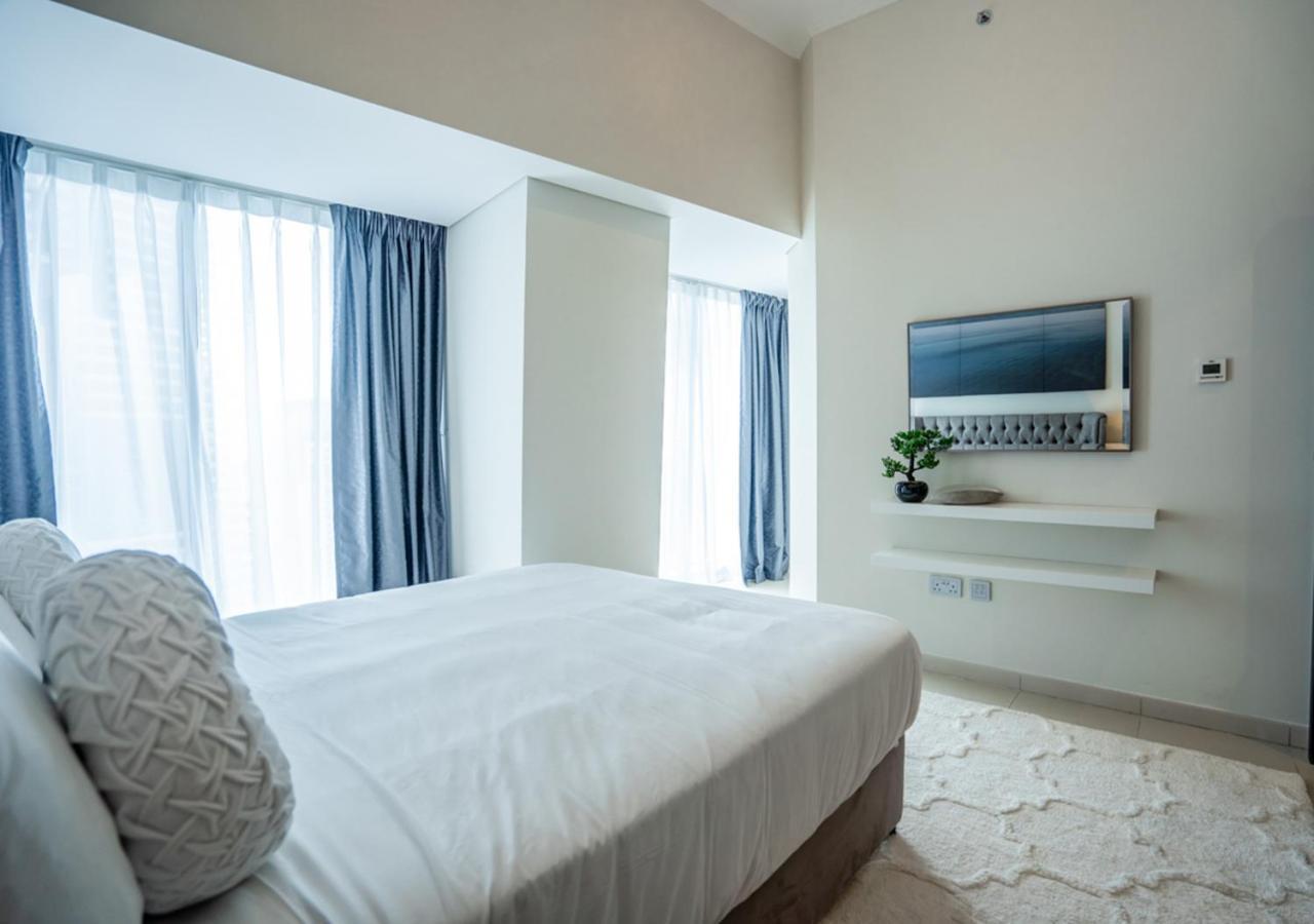 Nasma Luxury Stays - Cayan Tower Дубай Экстерьер фото